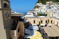 CAPRI, ITALY - JULY 2, 2018: view of Capri clock tower and Piazzetta square with tourists visiting the island of Capri, Italy Royalty Free Stock Photo