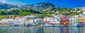 Capri, Italy - June 2021: Panoramic view of city port and colorful homes Royalty Free Stock Photo