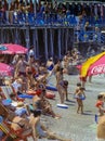 CAPRI, ITALY, 1967 - Many people enjoy a beautiful summer day on the beach of Bagni di Tiberio in Capri Royalty Free Stock Photo