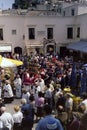 CAPRI, ITALY, MAY 1974 - The statue of San Costanzo, patron saint of the island, crosses the Piazzetta of Capri in procession Royalty Free Stock Photo