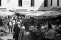 CAPRI, ITALY, 1958 - Tourists stroll in the famous Piazzetta or relax while sitting at the bar tables