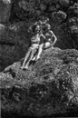 Capri, Italy, 1932 - Two beautiful girls on a rock notice something interesting