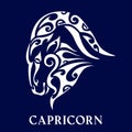 Capricorn. Tattoo maori tribal style. Horoscope. Astrological zodiac sign. Silhouette isolated on blue
