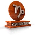 Capricorn zodiac sign. 3D illustration of the zodiac sign Capricorn made of stone on a wooden stand with the name of the sign at t Royalty Free Stock Photo