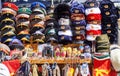 Caps, hats and souvenirs with the insignia of the Soviet Union and the German Democratic Republic at a stall near Checkpoint Royalty Free Stock Photo