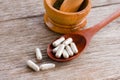 White herbal powder medicine capsules