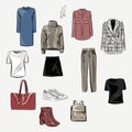 Capsule basic wardrobe for a woman. Minimalism. Fashion. Big cupboard. Wardrobe with a set of clothes on hangers and bags. Isolate