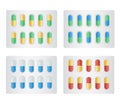 Capsule in Blister Pack. Different colours yellow, green, blue, red. pills for illness and pain treatment. Package of tablets. Royalty Free Stock Photo