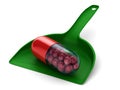 Capsule in dustpan on white background. Isolated 3D illustration