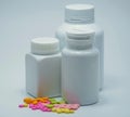 Capsule pills with bottles Royalty Free Stock Photo