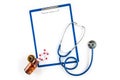 Capsules and bottle with clipboard and stethoscope cardiology Royalty Free Stock Photo