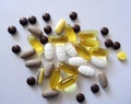 Capsules, dragees and tablets of necessary supplements to maintain good health Royalty Free Stock Photo