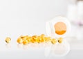Capsules of fish oil spilled Royalty Free Stock Photo