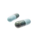 Capsules of medicine for anti biotic, blue and green capsules Royalty Free Stock Photo