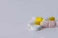 capsules and tablets oval and round on a white background Royalty Free Stock Photo