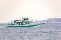 The Captain Al, a charter wreck fishing boat, sailing back to shore with Long Beach Long Island in the background