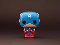 A Captain America Funko POP Mini Vinyl Figure on a black background