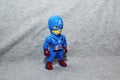 Captain America`s toys a gray background