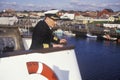 The captain of the Bluenose atop the ferry to guide it into the dock, Yarmouth, Nova Scotia