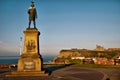 Captain Cook looking over Whitby harbour Royalty Free Stock Photo