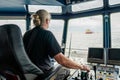 Captain of deck Officer on bridge of vessel or ship during navigaton watch at sea