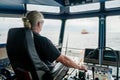 Captain of deck Officer on bridge of vessel or ship during navigaton watch at sea