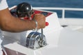 Captain at the helm yacht. Men`s hand drives a yacht. concept of sea recreation and tourism