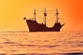 Captain Memo`s Pirate Cruise on colorful sunset background in Gulf Coast Beaches.
