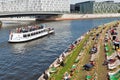 Spree river and touristic ship in Berlin, Germany.