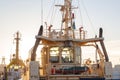 Captain`s cabin on boat in harbor in lights of sunnset. Winter Royalty Free Stock Photo