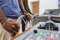 Captain`s hands at the helm of a boat.Captain`s hands at the helm of a boat.Captain`s hands at the helm of a boat Royalty Free Stock Photo