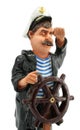 Captain with steering-wheel isolated Royalty Free Stock Photo