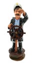 Captain with steering-wheel isolated Royalty Free Stock Photo