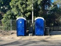 portable chemical toilet in public park