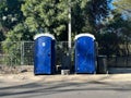 portable chemical toilet in public park