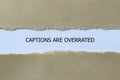 captions are overrated on white paper Royalty Free Stock Photo