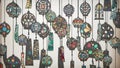 Vibrant Stained Glass Wind Chimes and Lanterns with Colorful Shadows Royalty Free Stock Photo
