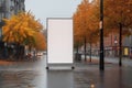 Captivating autumn display, blank vertical outdoor billboard mockup on city street Royalty Free Stock Photo