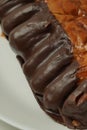 Captivating close-up: Chocolate banana pastry featuring a rich blend of sweet banana cream and chocolate