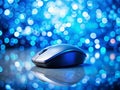 Closeup of a Modern Computer Mouse on a Vibrant Blue Background with Bokeh Effect A Professional Office Technology Royalty Free Stock Photo