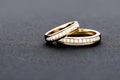 Captivating close up shot of two wedding rings, delicately intertwined to symbolize the everlasting bond of love and commitment. Royalty Free Stock Photo