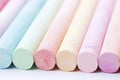 Whimsical Symphony, An Enchanting Array of Pastel Colored Pencils Dancing on a Pristine Canvas Royalty Free Stock Photo