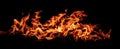The Captivating Dance of Flames Against a Dark Background.AI generated image Royalty Free Stock Photo