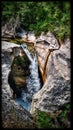 Captivating detail of a cascading river over beautiful rock formations in the picturesque landscapes of Southern France