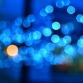 A Captivating Display of Soft Blue Lights Creating a Magical Atmosphere with Dots of Colorful Radiance in the Background Royalty Free Stock Photo