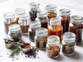 Dried Herbs And Spices In Glass Jars