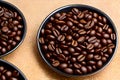 Black roasted coffee in a bowl generated by ai