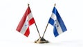 Miniscule Flags of Honduras and Austria Symbolize Peaceful Global Cooperation on a Pristine White Background A Royalty Free Stock Photo