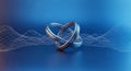 Intertwined Metal Rings on a Blue Gradient Background Royalty Free Stock Photo