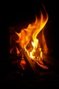 firewood with heat warm color burning woods in the stove, fire, concept of wood heating and burning Royalty Free Stock Photo
